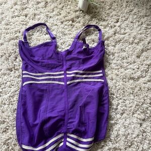 Vibrant Purple Swimsuit with Silver Accents